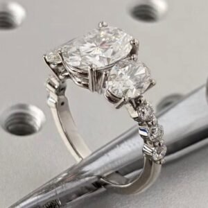 Oval Trilogy Ring with Round Stones Down the side